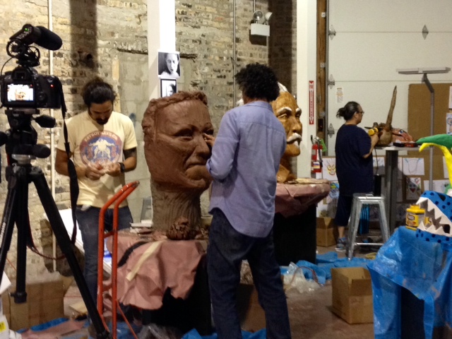 Artist Pedro Adorno Irizarry creating a mask of Puerto Rican poet, Julia de Burgos, at the Segundo Ruiz Belvis Cultural Center mask-making workshop this past Saturday.